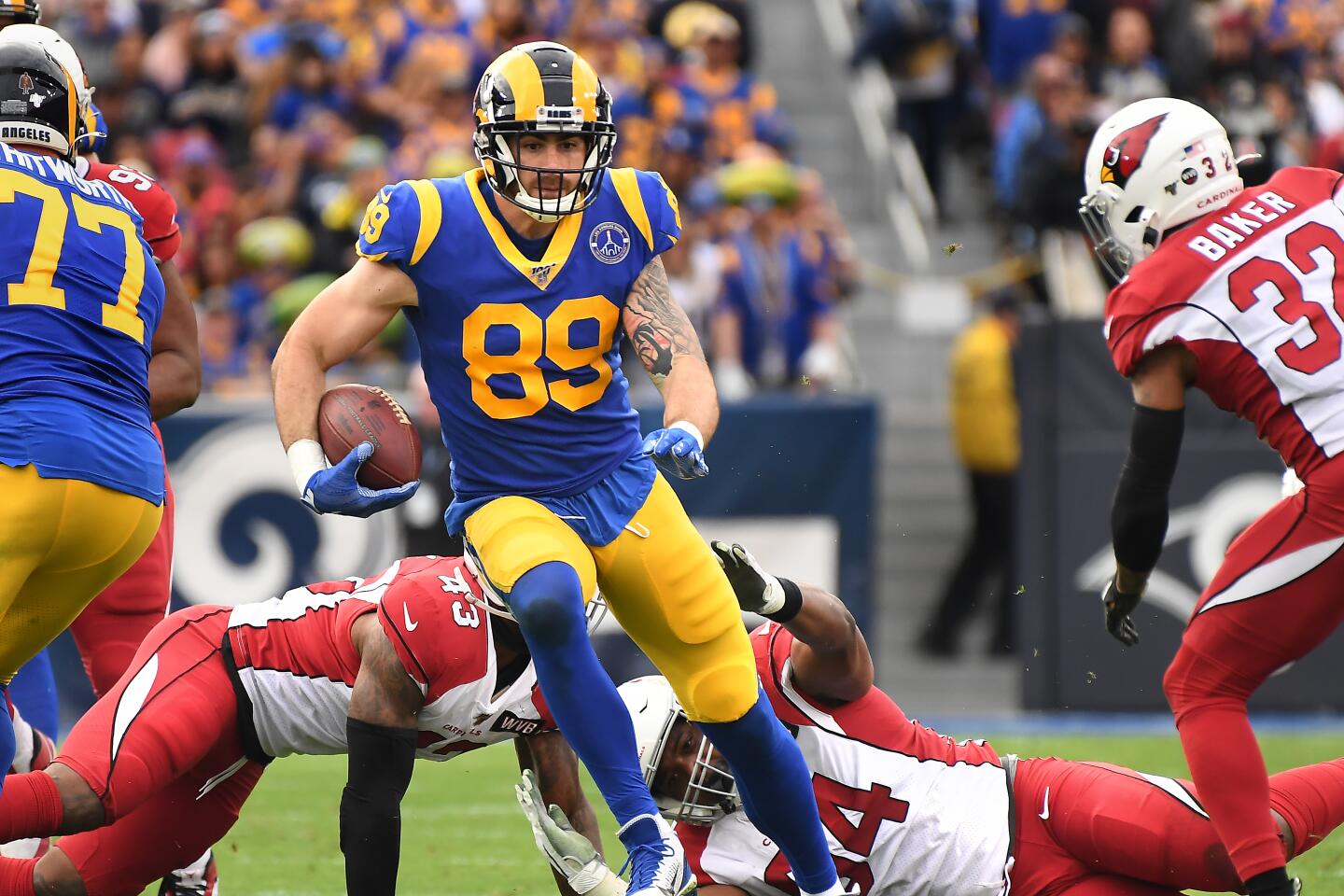 Rams tight end Tyler Higbee runs with the ball against the Arizona Cardinals in the second quarter.