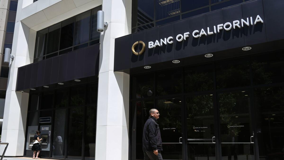 Banc of California is under pressure from a major shareholder to launch an independent investigation into the relationships between people close to the bank and an L.A. financier who pleaded guilty to securities fraud.