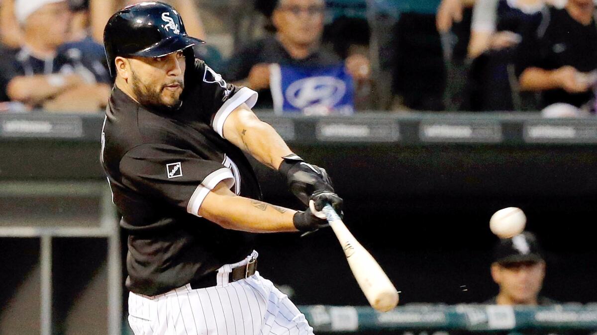 Dioner Navarro connects for a sacrifice fly in the White Sox's game Thursday in Chicago.