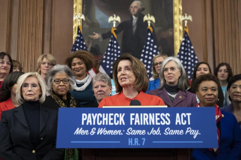 Speaker of the House Nancy Pelosi, D-Calif., joined at left by Lilly Ledbetter, an activist for workplace equality, speaks at an event to advocate for the Paycheck Fairness Act on the 10th anniversary of President Barack Obama signing the Lilly Ledbetter Fair Pay Act, at the Capitol in Washington, Wednesday, Jan. 30, 2019. The legislation, a top tier issue for the new Democratic majority in the House, would strengthen the Equal Pay Act of 1963 and guarantee that women can challenge pay discrimination and hold employers accountable. z(AP Photo/J. Scott Applewhite)