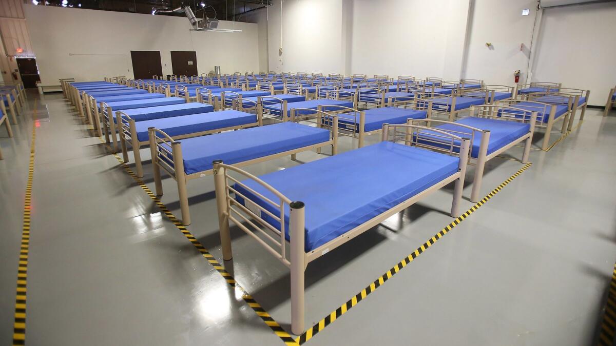 Beds in the new interim homeless shelter, The Link, in Santa Ana.