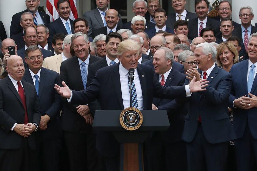 WASHINGTON, DC - MAY 04: U.S. President Donald Trump (C) speaks while flanked by House Republicans after they passed legislation aimed at repealing and replacing ObamaCare, during an event in the Rose Garden at the White House, on May 4, 2017 in Washington, DC. The House bill would still need to pass the Senate before being signed into law. (Photo by Mark Wilson/Getty Images) ** OUTS - ELSENT, FPG, CM - OUTS * NM, PH, VA if sourced by CT, LA or MoD **