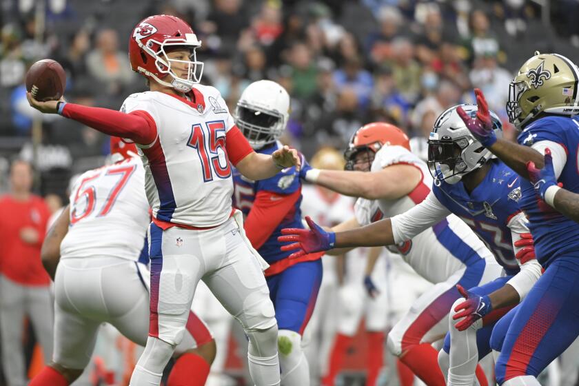 FILE - AFC quarterback Patrick Mahomes (15), of the Kansas City Chiefs passes against the NFC 