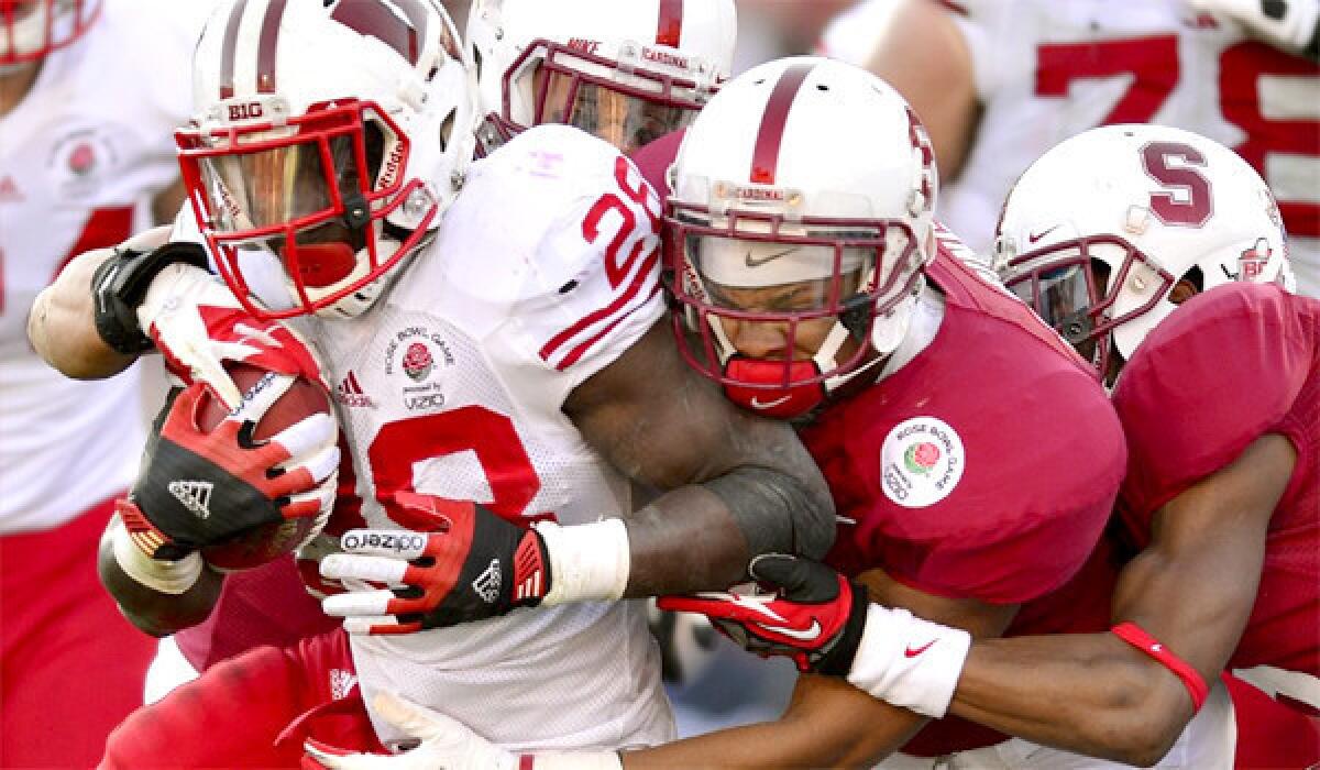 Wisconsin running back Montee Ball is stopped by the Stanford defense in the 99th Rose Bowl in Pasadena on Jan. 1, 2013.