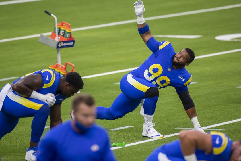 INGLEWOOD, CA - AUGUST 22: Rams Aaron Donald No. 99, stretches during scrimmage.