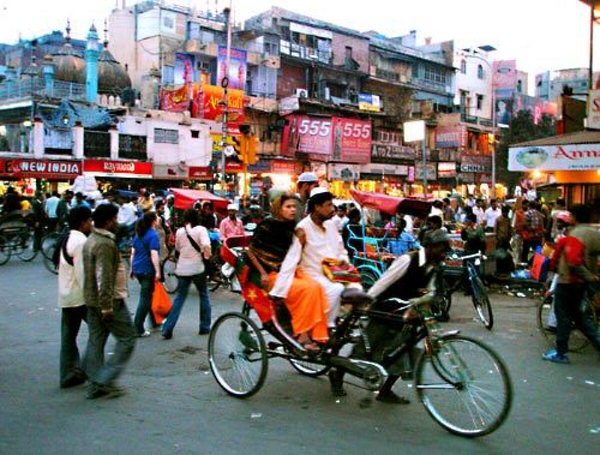 Chandni Chowk is one of the oldest and busiest markets in Old Delhi. Expect to see rickshaws and cows on the roads.