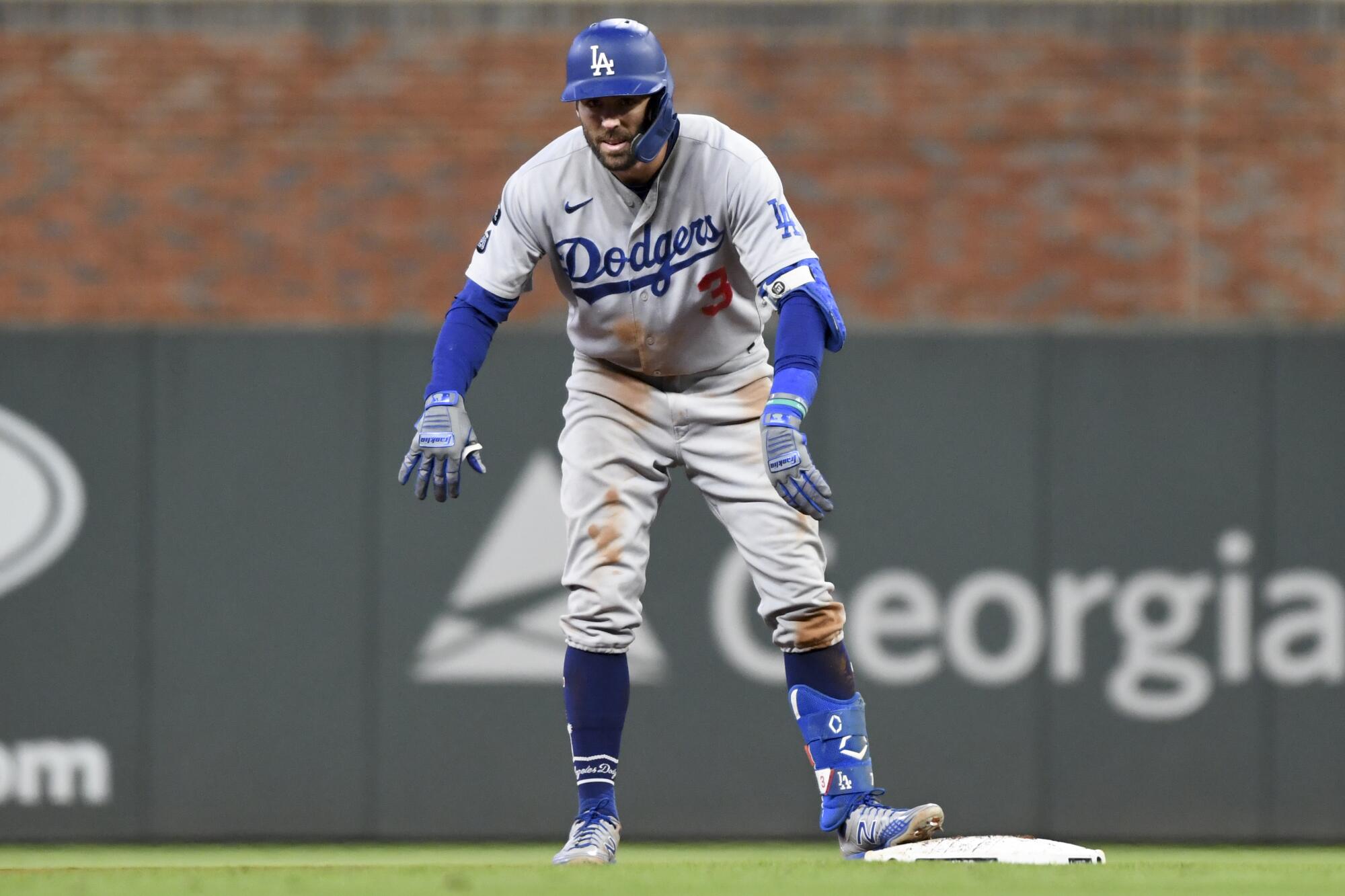 Los Angeles Dodgers' Chris Taylor reacts after hitting a go-ahead two-run double
