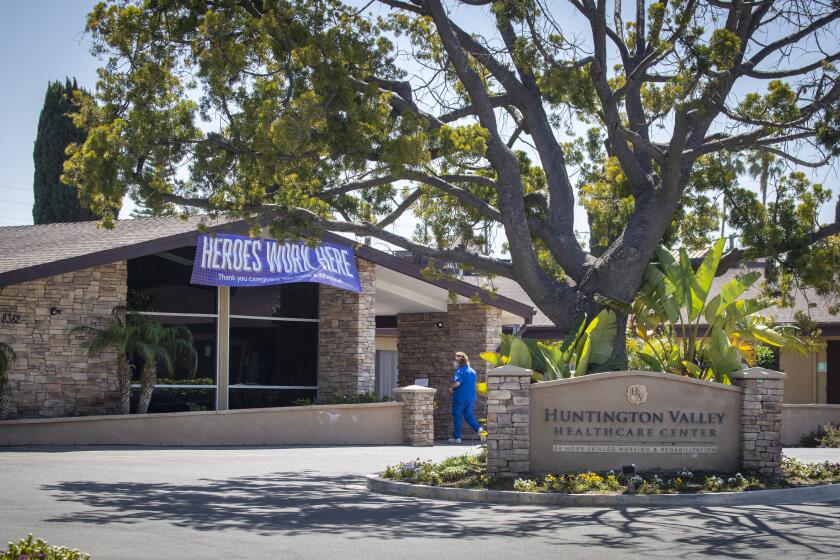 HUNTINGTON BEACH, CA -- WEDNESDAY, APRIL 22, 2020: Exterior view of Huntington Valley Healthcare Center in Huntington Beach, CA, on April 22, 2020. Two patients at the Orange County nursing home died this week from COVID-19 as a coronavirus outbreak at the facility has sickened half its residents and several staff members. Thus far, 48 other patients and 24 healthcare staff members at Huntington Valley Healthcare Center in Huntington Beach, have tested positive for the coronavirus, according to a news release from the company. (Allen J. Schaben / Los Angeles Times)