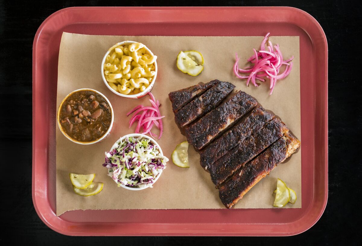 Spare ribs, coleslaw, beans and mac and cheese from Slab Barbecue