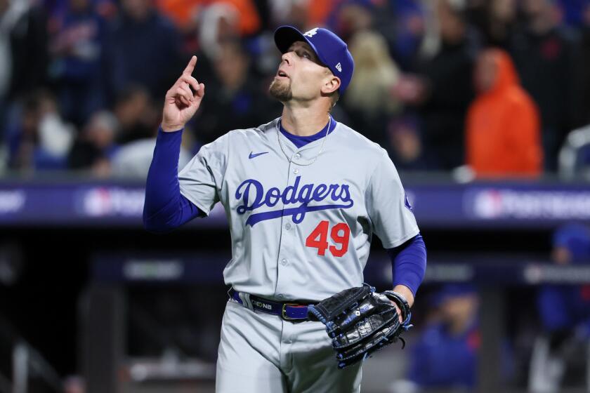 Dodgers reliever Blake Treinen gestures against the Mets at Citi Field in New York.