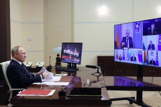 Russian President Vladimir Putin attends a meeting with leaders of the Collective Security Treaty Organization (CSTO) to discuss support for Armenia following clashes on its border with Azerbaijan, via videoconference at the Novo-Ogaryovo state residence, outside Moscow, Russia, Friday, Oct. 28, 2022. (Mikhail Metzel, Sputnik, Kremlin Pool Photo via AP)