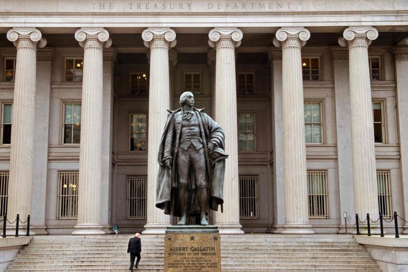 A statue of Alexander Hamilton stands outside the U.S. Treasury Department building in Washington, D.C.