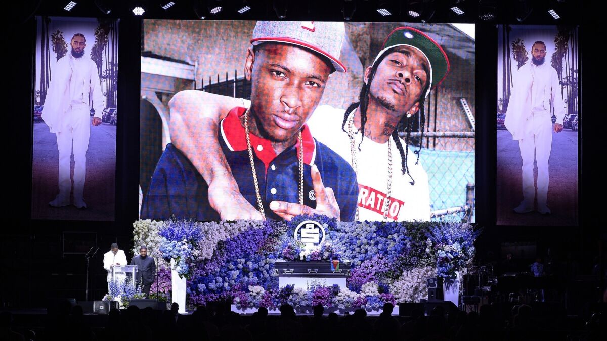 YG and Mustard speak during their late friend Nipsey Hussle's memorial at Staples Center on April 11
