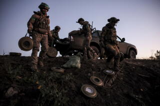 In this photo provided by Ukraine's 24th Mechanised Brigade press service