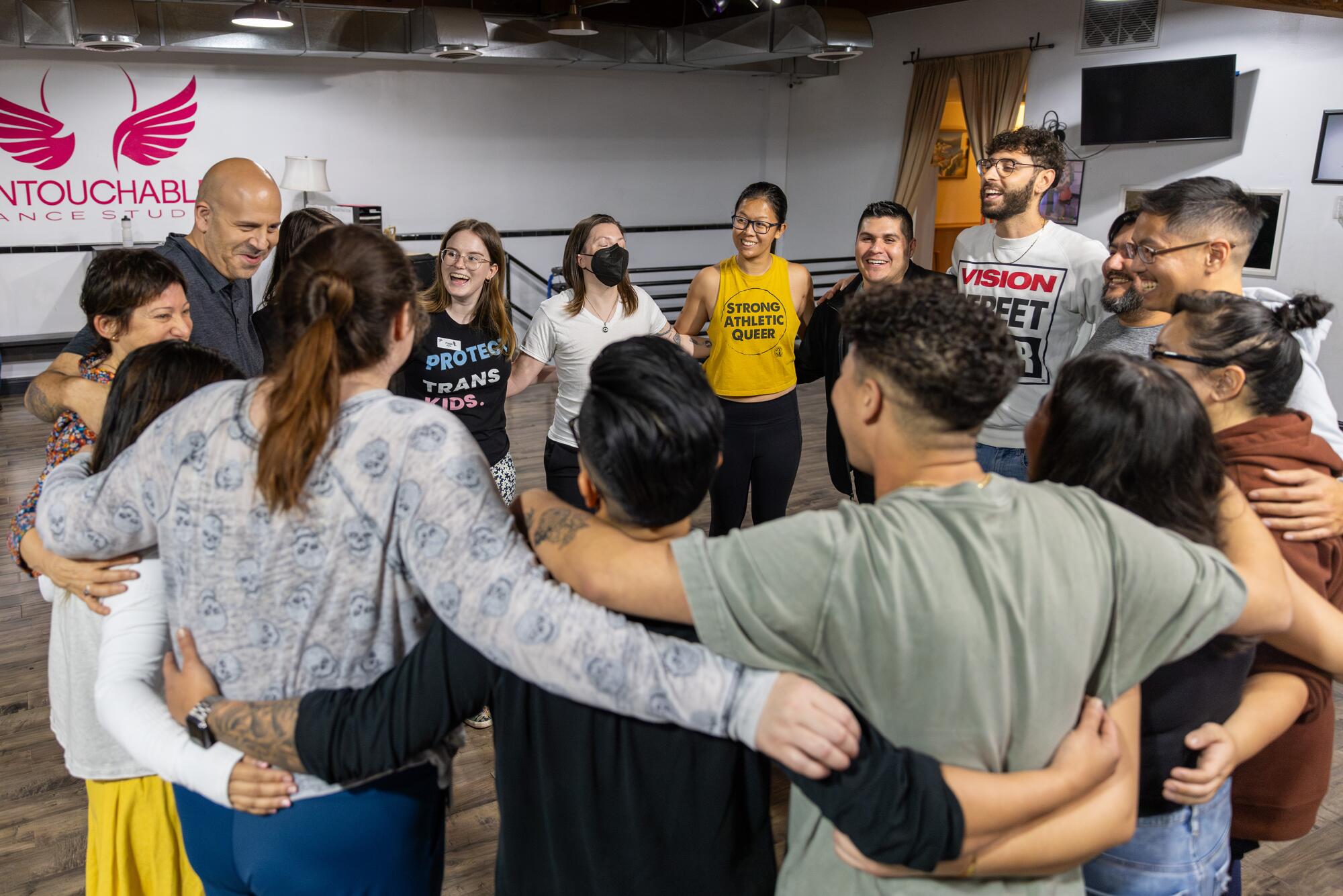 Members of the Queerchata dance class take a moment to connect at the end of their lesson at Untouchable Dance Studio 
