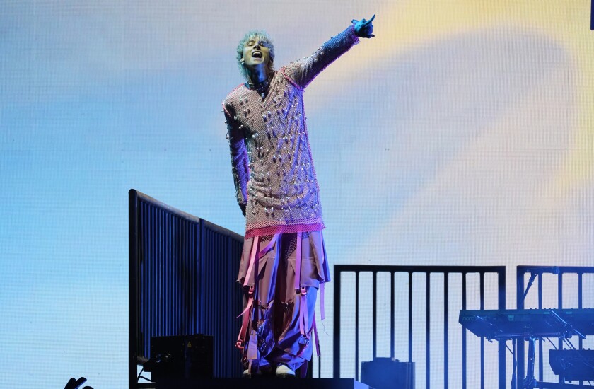 Machine Gun Kelly performs during day one of the Bud Light Super Bowl Music Fest on Thursday, Feb. 10, 2022, at Crypto.com Arena in Los Angeles. (AP Photo/Chris Pizzello)