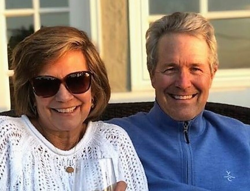 "When the Veil Comes Down" author Casey Gauntt, right, with his wife, Hilary.