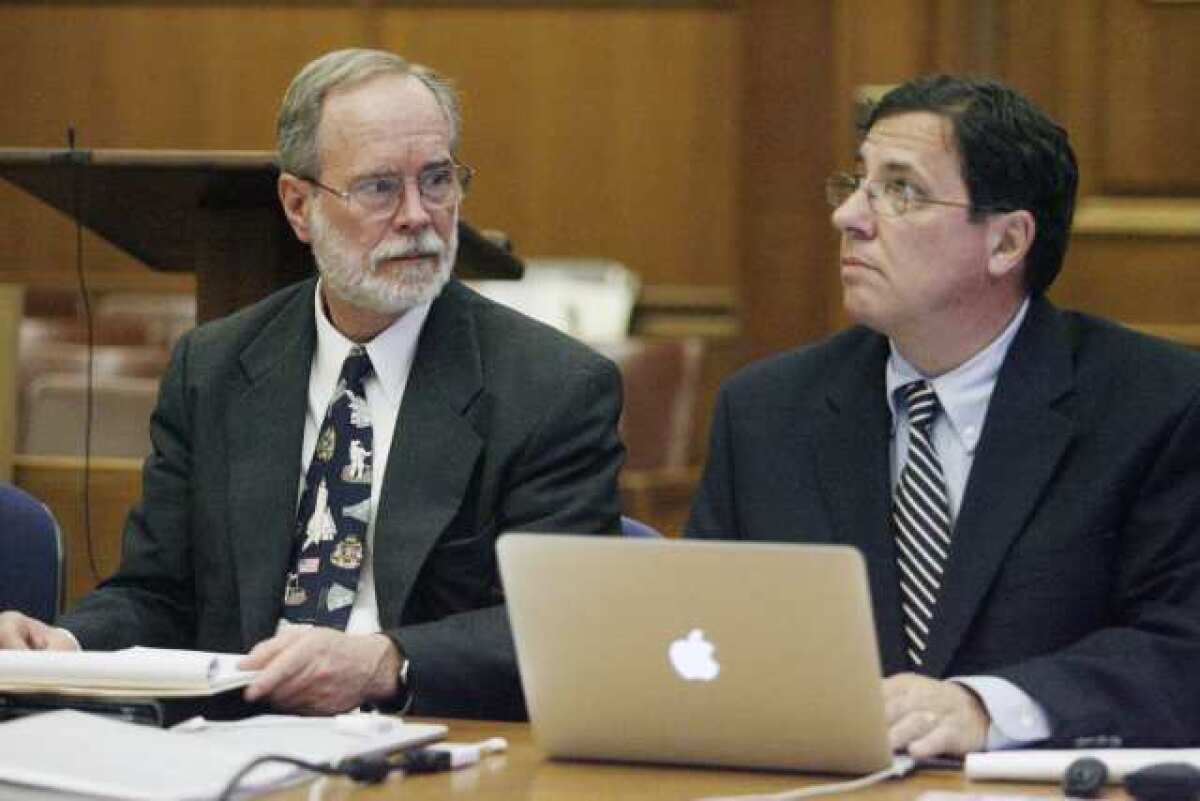 Former JPL worker David Coppedge, left, and William Becker appear in court at the Stanley Mosk Courthouse in Los Angeles.