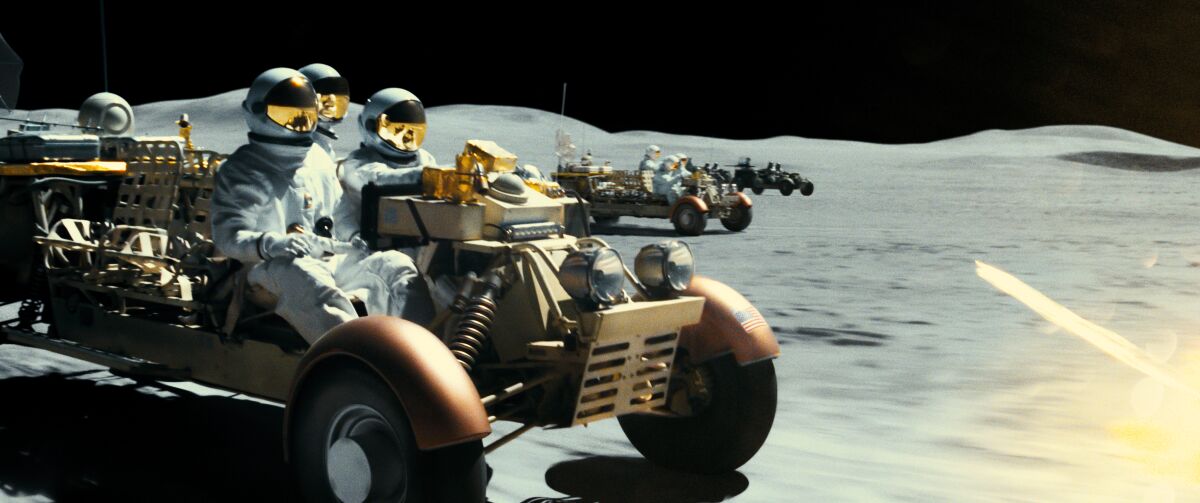 A scene from "Ad Astra" in which Brad Pitt's character is attacked by rover-driving pirates on the lunar surface.