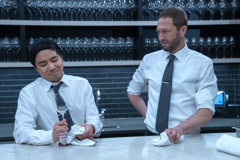 Andrew Lopez and Ebon Moss-Bachrach in a scene from Season 2 of FX's "The Bear."