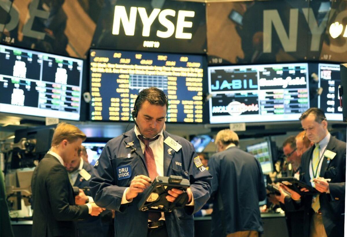 Traders on floor of New York Stock Exchange.