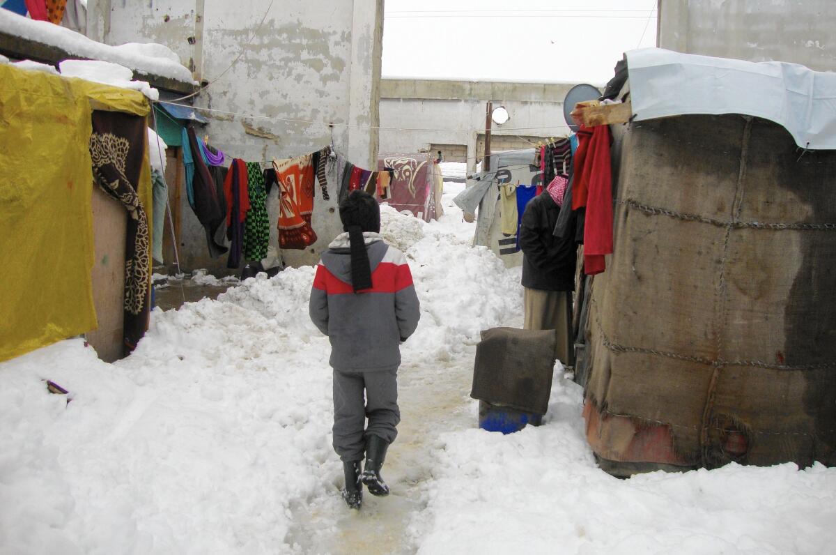 More than 700 Syrian refugees, including 300 children, live in makeshift tents at an abandoned sugar mill in Chtaura, Lebanon.