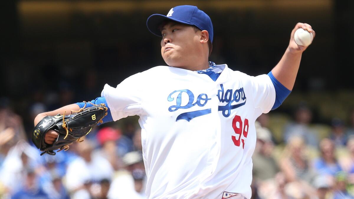 Dodgers starter Hyun-Jin Ryu delivers a pitch during Sunday's 6-1 loss to the Colorado Rockies.