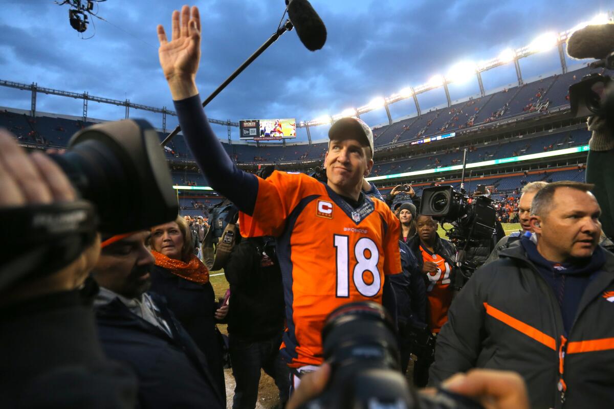 Denver Broncos quarterback Peyton Manning walks off the field after a win over the New England Patriots on Jan. 24.