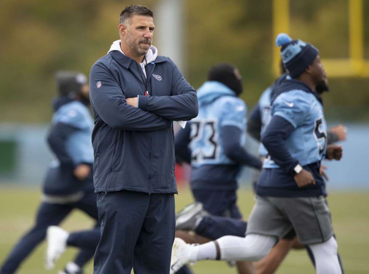 Tennessee Titans NFL football head coach Mike Vrabel watches his players run sprints during practice at Saint Thomas Sports Park in Nashville, Tenn., Wednesday, Nov. 3, 2021. The Titans play against the Los Angeles Rams on Sunday in Los Angeles. (George WalkerIV/The Tennessean via AP)