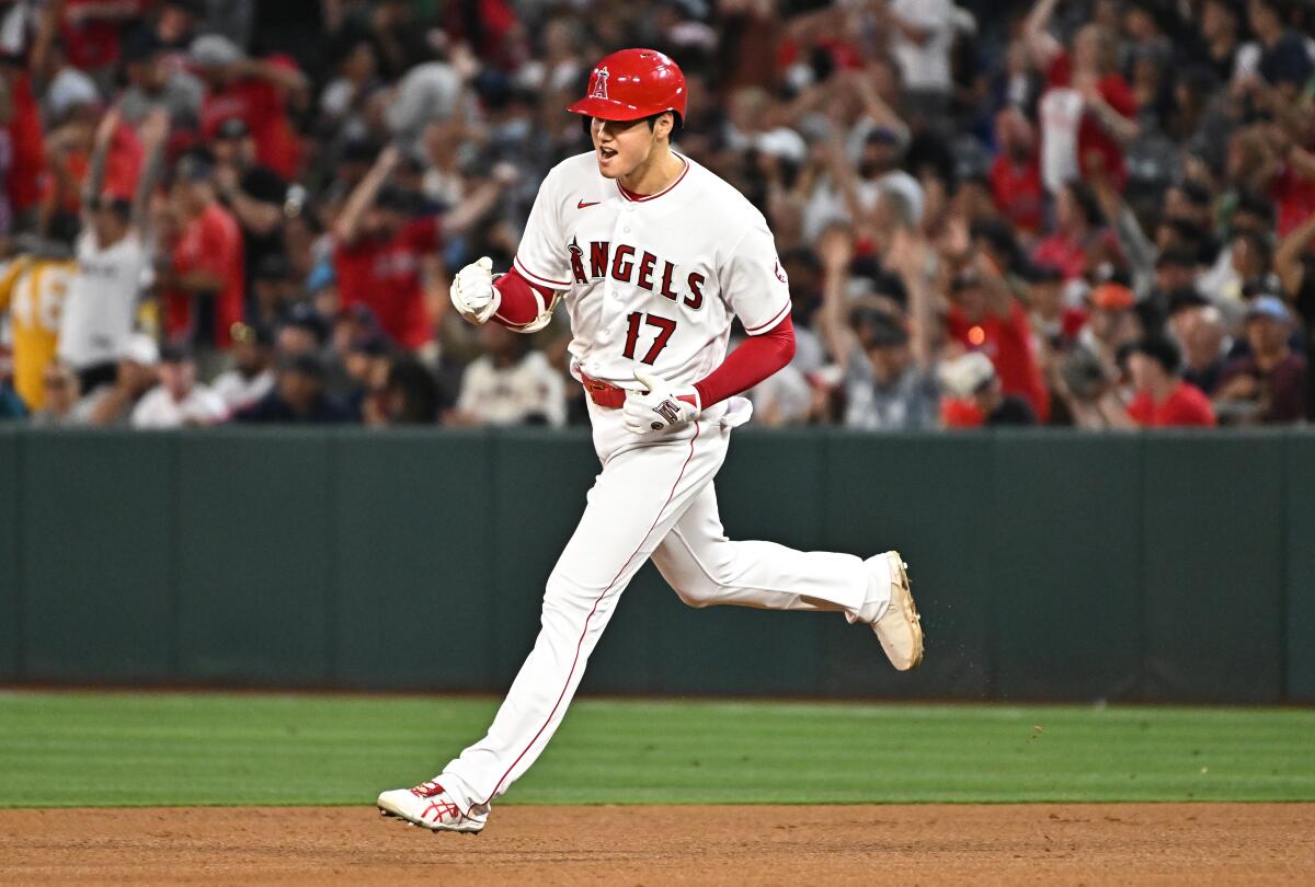 Shohei Ohtani circles the bases after his two-run home run Thursday.