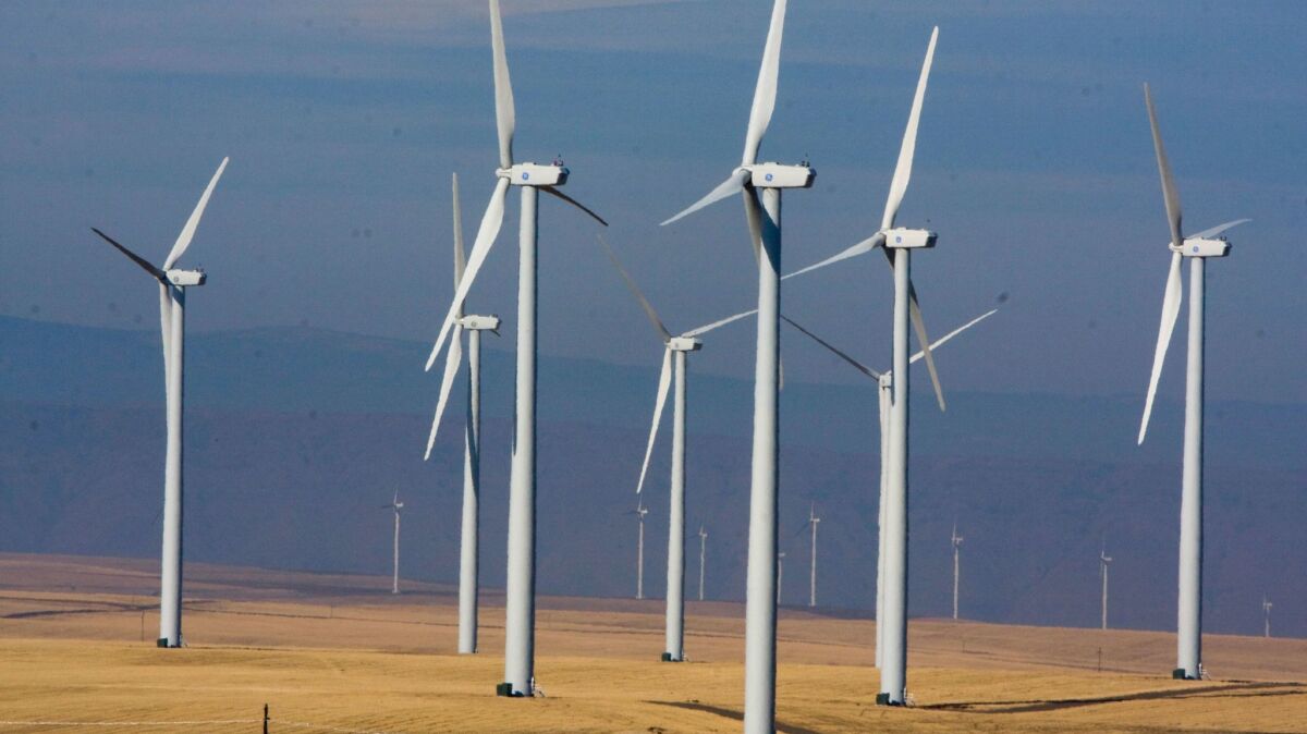 Wind turbines dot the landscape east of Wasco, Ore. on Oct. 29, 2008.