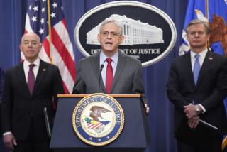 Attorney General Merrick Garland speaks with reporters during a news conference at the Department of Justice, Wednesday, Dec. 6, 2023, in Washington, as Secretary of Homeland Security Alejandro Mayorkas, left, and FBI Director Christopher Wray, look on. (AP Photo/Mark Schiefelbein)