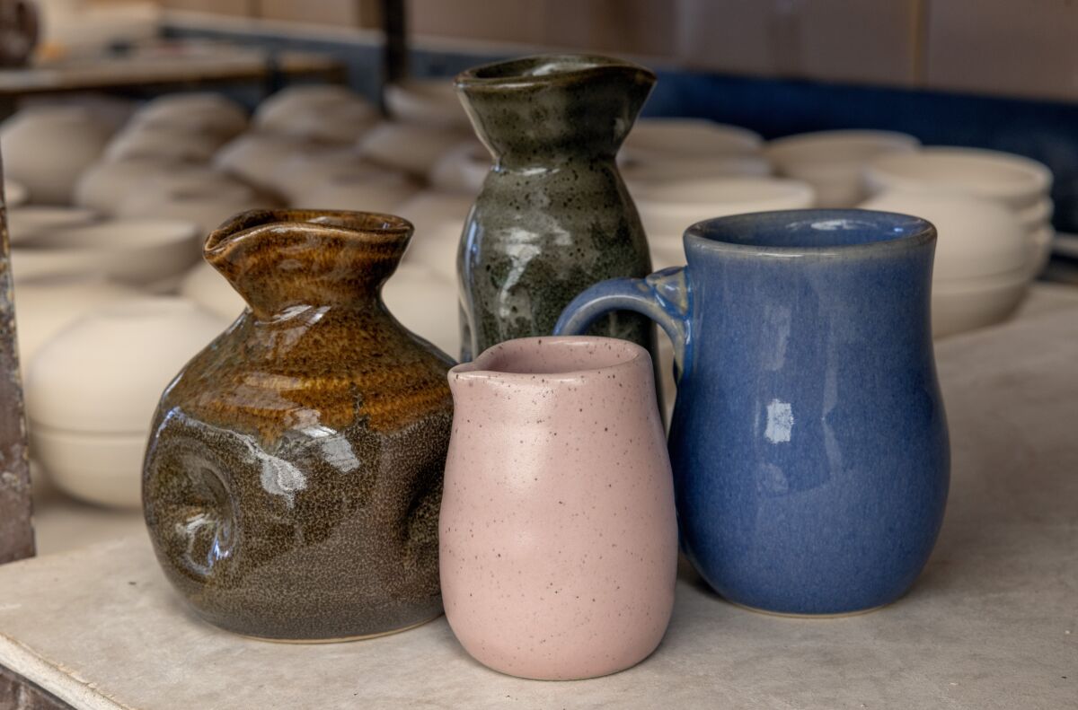 Ceramic pottery, including soy pots, at The Wheel.