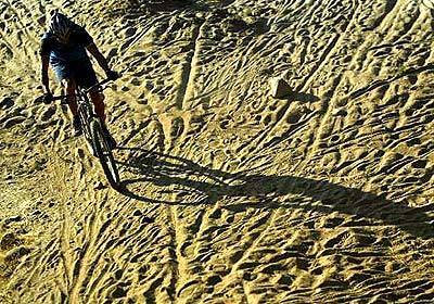Gerrit Slingerland pushes himself on a gearless bike against some of the regions steepest off-road trails at the Santiago Oaks Regional Park in Orange.