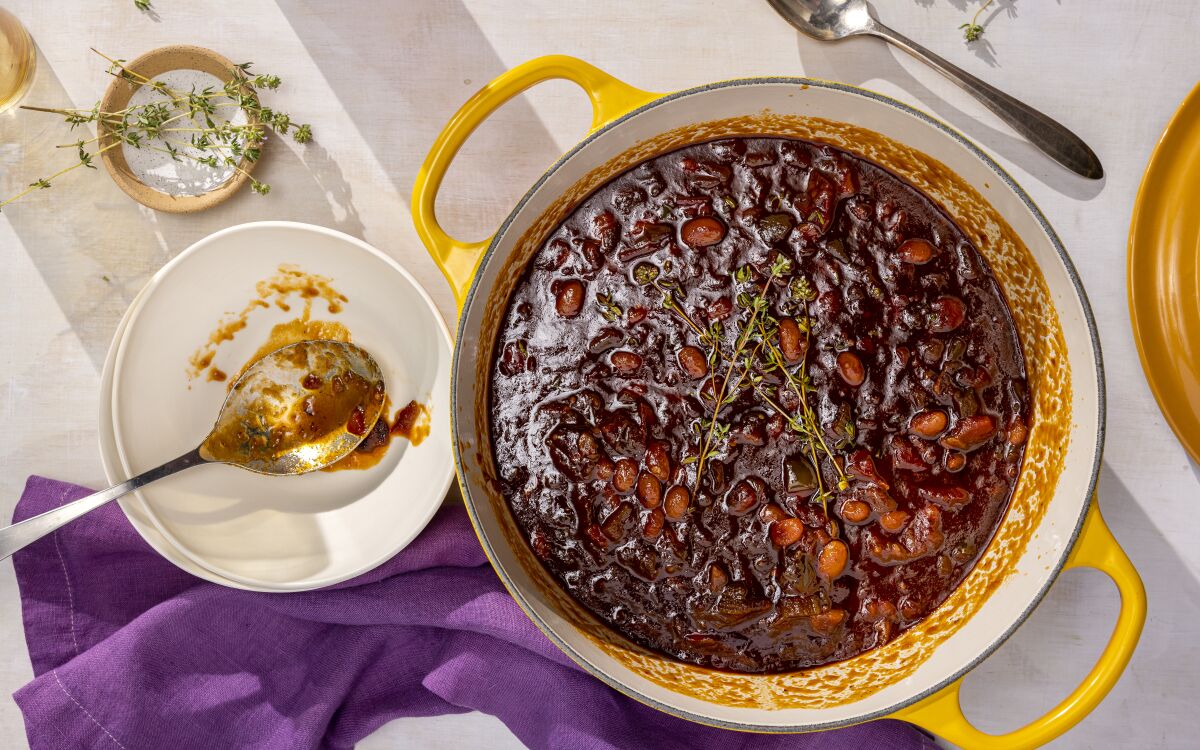 Chef Martin Draluck's slow-cooked pinto beans with holy trinity (onions, bell peppers and celery) and bacon