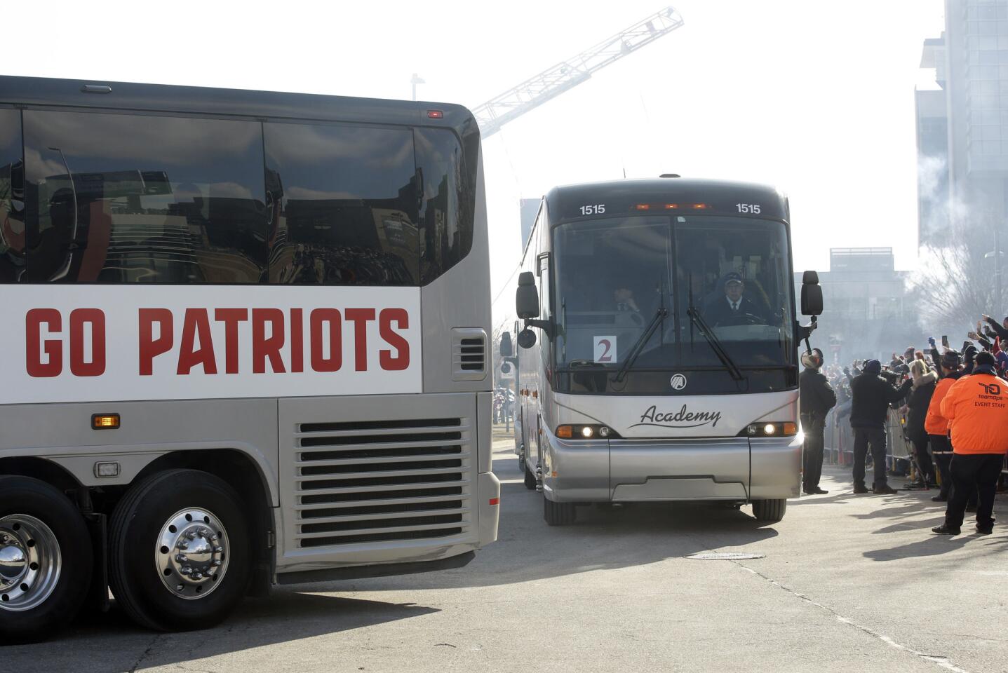 Buses carrying members of the New England Patriots football team depart Gillette Stadium, in Foxborough, Mass., on their way to Atlanta, Ga., following an NFL Super Bowl send-off rally for the team, Sunday, Jan. 27, 2019. The Los Angeles Rams are to play the New England Patriots in Super Bowl 53 on Feb. 3, in Atlanta.