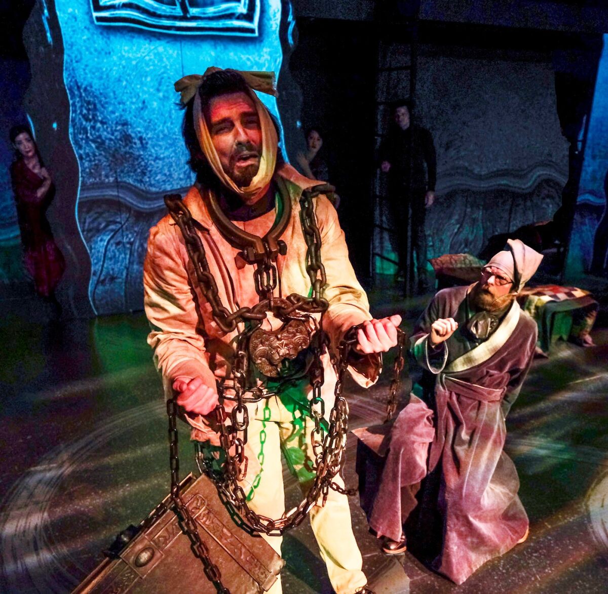 Luke Monday, left,and Brian Mackey in Lamb's Players Theatre's "A Christmas Carol."
