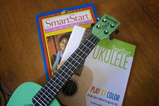 San Diego, CA - May 05: Jess Baron, founder of Guitars in the Classroom, wrote Smart Start Guitar and Smart Start Ukulele. Guitars in the Classroom is a San Diego-based nonprofit that brings music and music education into schools. (Nelvin C. Cepeda / The San Diego Union-Tribune)