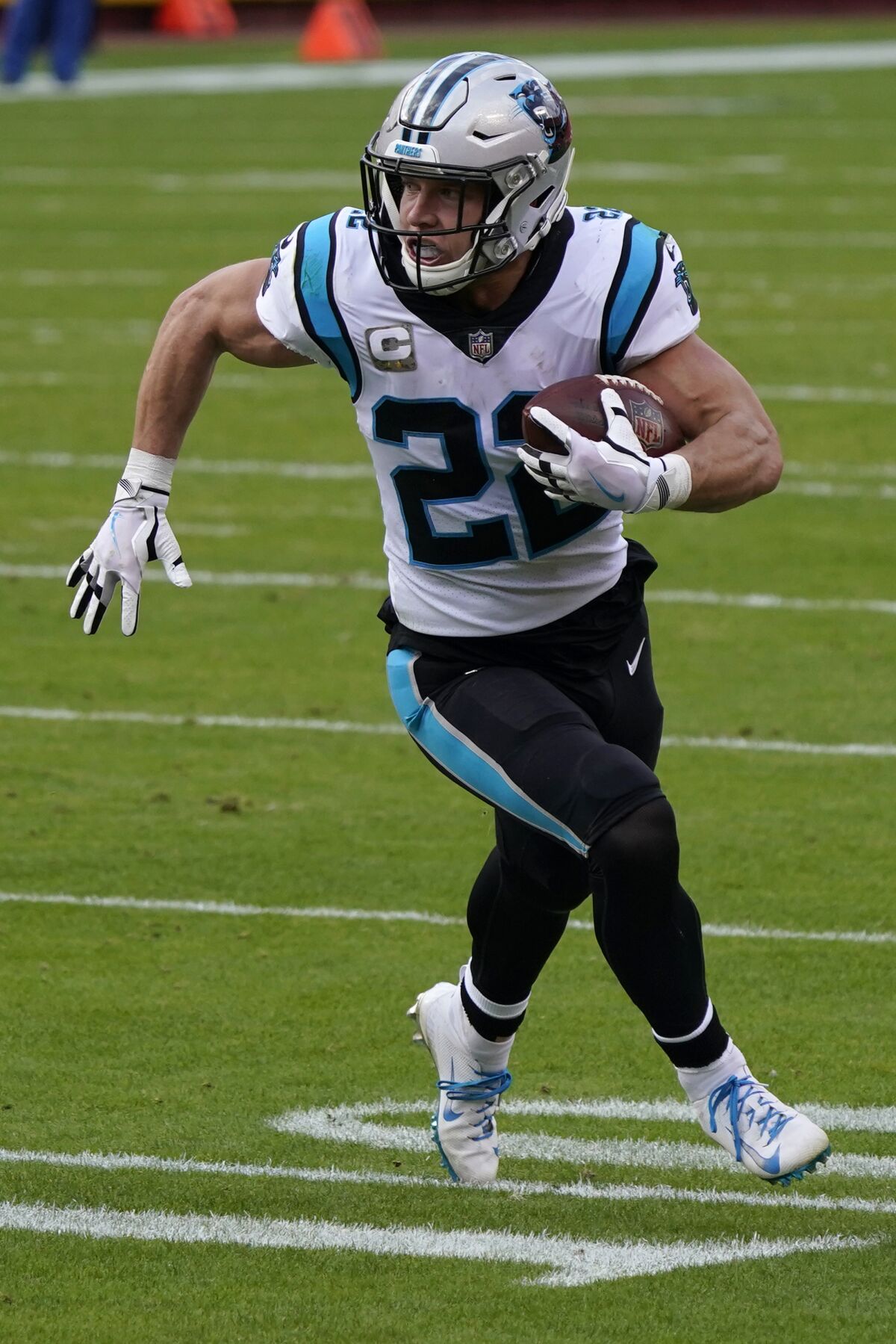 Carolina Panthers running back Christian McCaffrey (22) runs toward the end zone to score against the Kansas City Chiefs during the first half of an NFL football game in Kansas City, Mo., Sunday, Nov. 8, 2020. (AP Photo/Jeff Roberson)