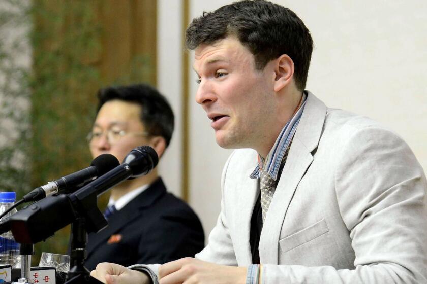 (FILES) This photo taken on February 29, 2016 and released by North Korea's official Korean Central News Agency (KCNA) on March 1, 2016, shows US student Otto Frederick Warmbier (R), who is arrested for committing hostile acts against North Korea, speaking at a press conference in Pyongyang. - Otto Warmbier was arrested in North Korea in January 2016, fell into a coma while incarcerated and died in the United States in June 2017. North Korea was ordered to pay the parents of Otto Warmbier more than $500 million, holding the country liable for the death of their son, a US federal judge said on December 24, 2018. (Photo by KCNA VIA KNS / KCNA / AFP)KCNA VIA KNS/AFP/Getty Images ** OUTS - ELSENT, FPG, CM - OUTS * NM, PH, VA if sourced by CT, LA or MoD **