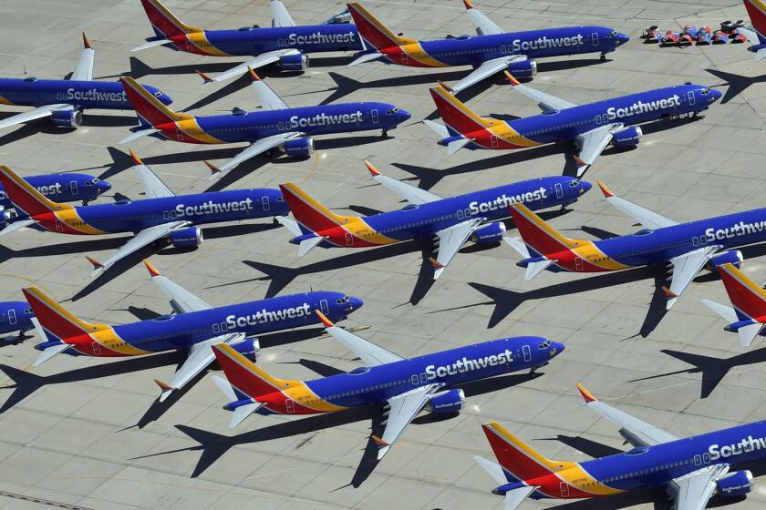 (FILES) In this file photo taken on March 28, 2019 Southwest Airlines Boeing 737 MAX aircraft are parked on the tarmac after being grounded, at the Southern California Logistics Airport in Victorville, California. - Boeing shares slumped on April 8, 2019 on the company's weakened profit outlook after it announced last week it will cut production of 737 planes following two deadly crashes.Shares were down 4.5 percent at $374.02 in afternoon trading, weighing on the Dow in the first session since Boeing announced late Friday it would trim production to 42 planes per month, down from 52 per month. (Photo by Mark RALSTON / AFP)MARK RALSTON/AFP/Getty Images ** OUTS - ELSENT, FPG, CM - OUTS * NM, PH, VA if sourced by CT, LA or MoD **