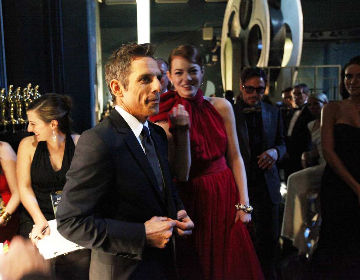 Oscar presenters Ben Stiller, left, and Emma Stone backstage at the 2012 Academy Awards in Hollywood.