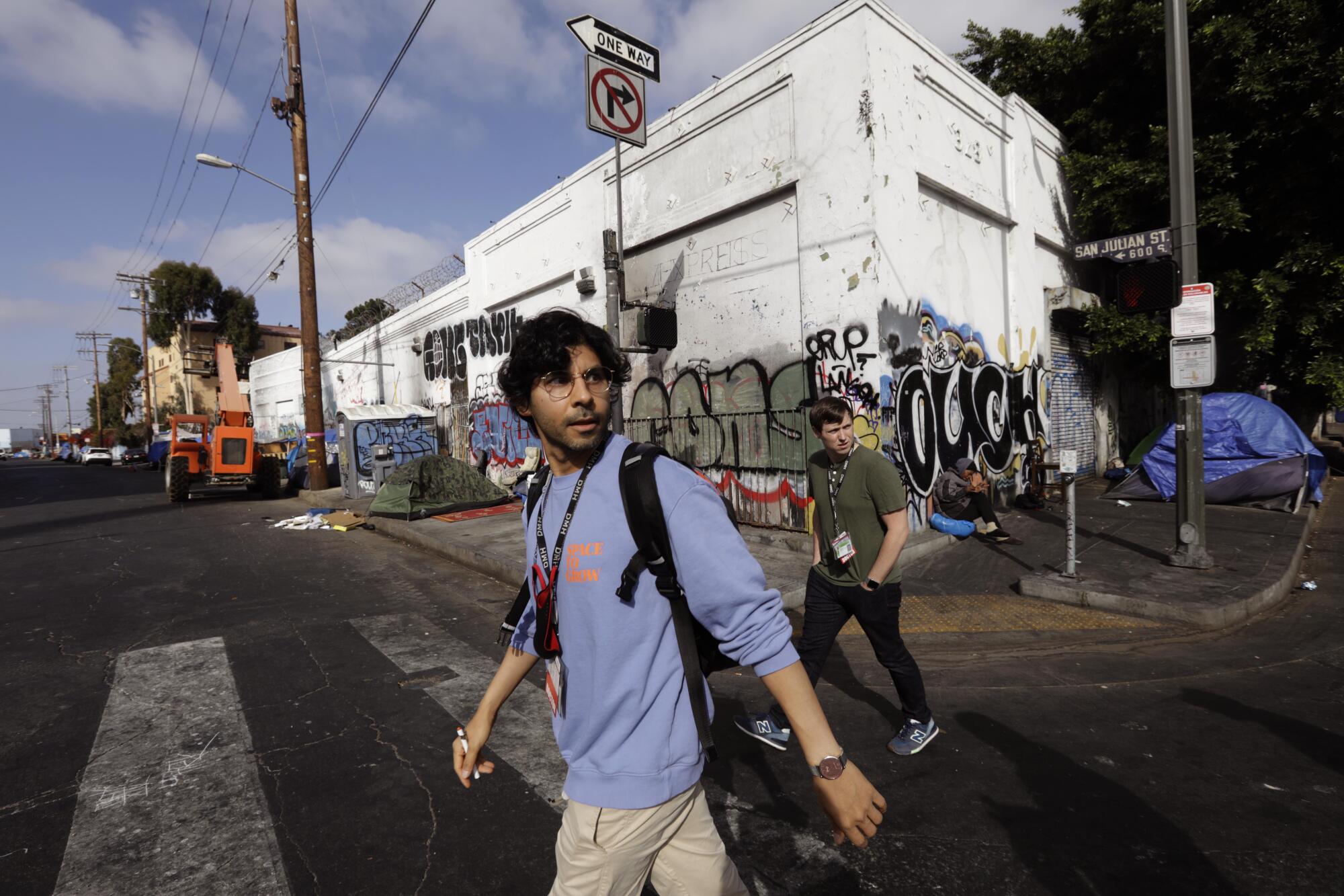 Dr. Shayan Rab, left, a street psychiatrist with the Los Angeles County Dept. of Mental Health