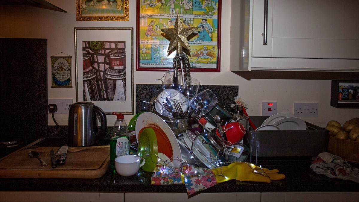 Sink and dishes Christmas tree. One of four photos that are part of a motherhood documentary project by photographer Elizabeth Dalziel. Elizabeth Dalziel /Contact Press Images. ONE TIME USE ONLY. Photographed on Saturday, Dec. 9, 2017.