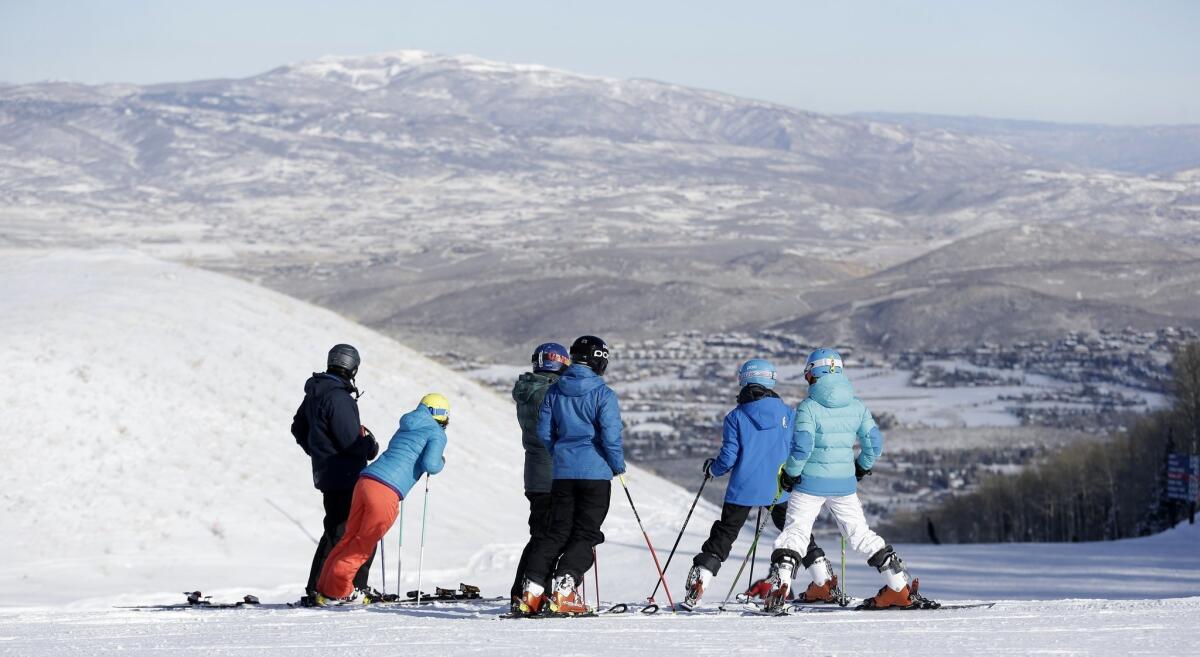 Skiers look down from the top of Park City Mountain Resort, which has been combined with Canyons and is now called just Park City.