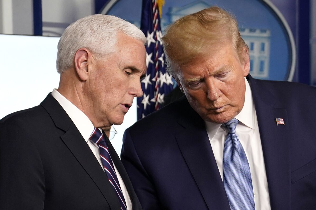 Donald Trump and Mike Pence at a recent coronavirus task force news conference.
