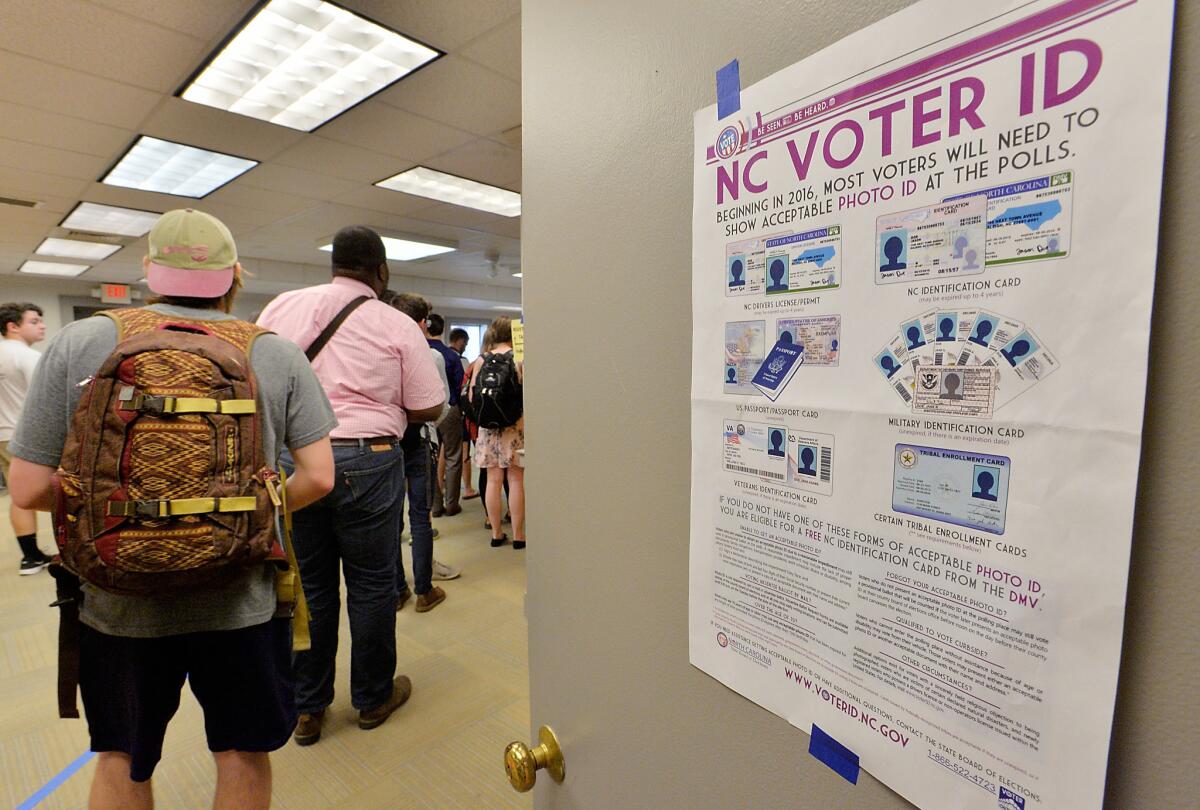 North Carolina State University students wait in line to vote in the primaries at Pullen Community Center on March 15 in Raleigh, N.C.