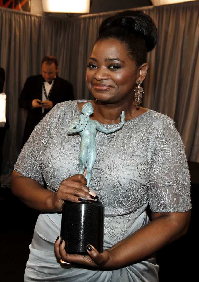 Octavia Spencer's Labradorite and diamond earrings by Irene Neuwirth were a perfect match to her opal gray Tadashi Shoji gown.