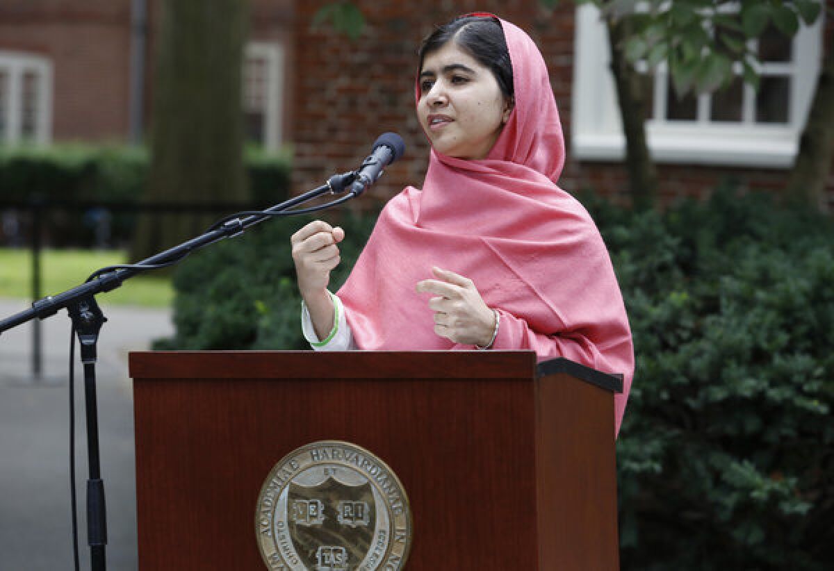 Malala Yousafzai speaks during a news conference at Harvard University.