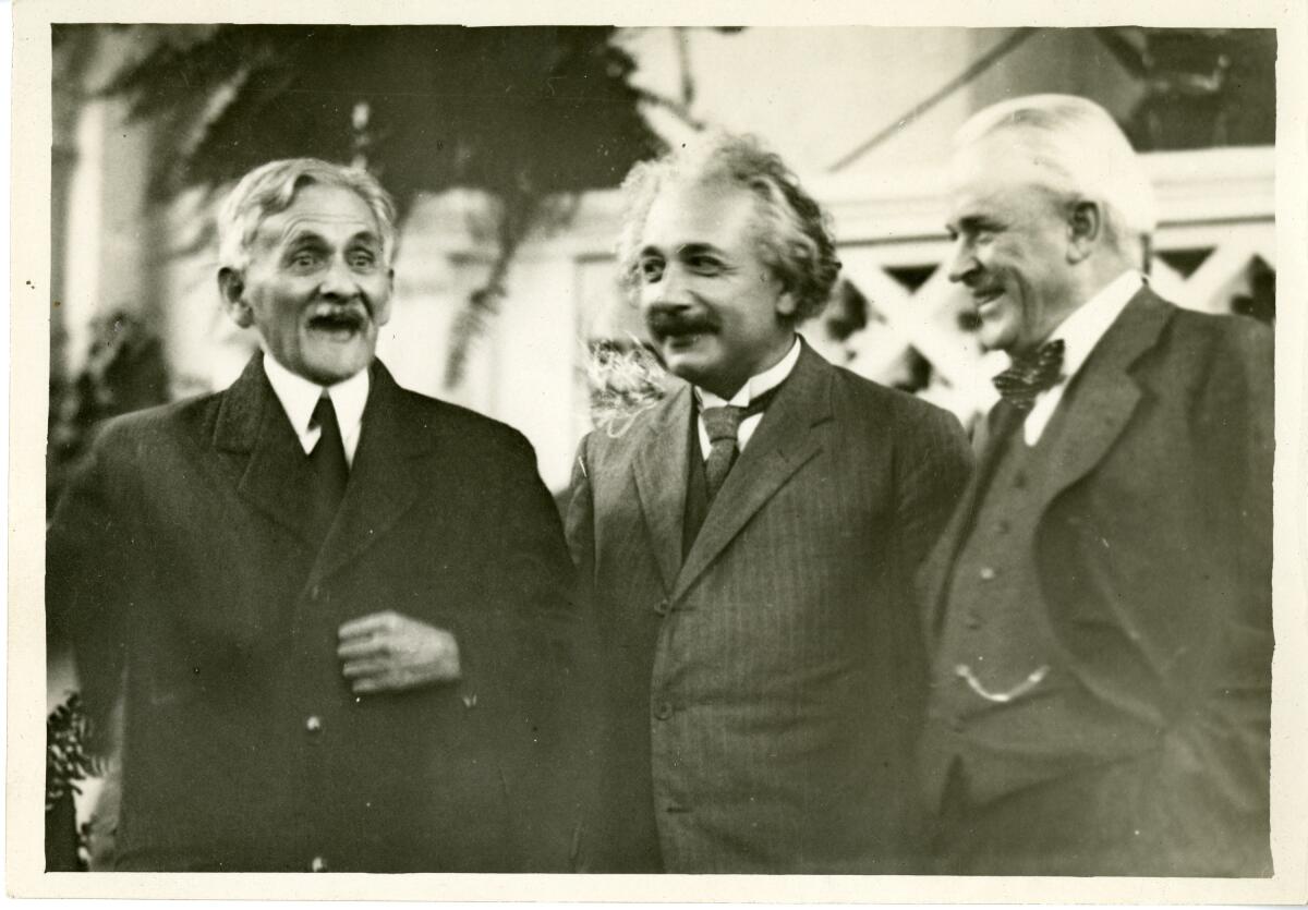 From left, physicists A.A. Michelson and Albert Einstein and former Caltech President Robert A. Millikan